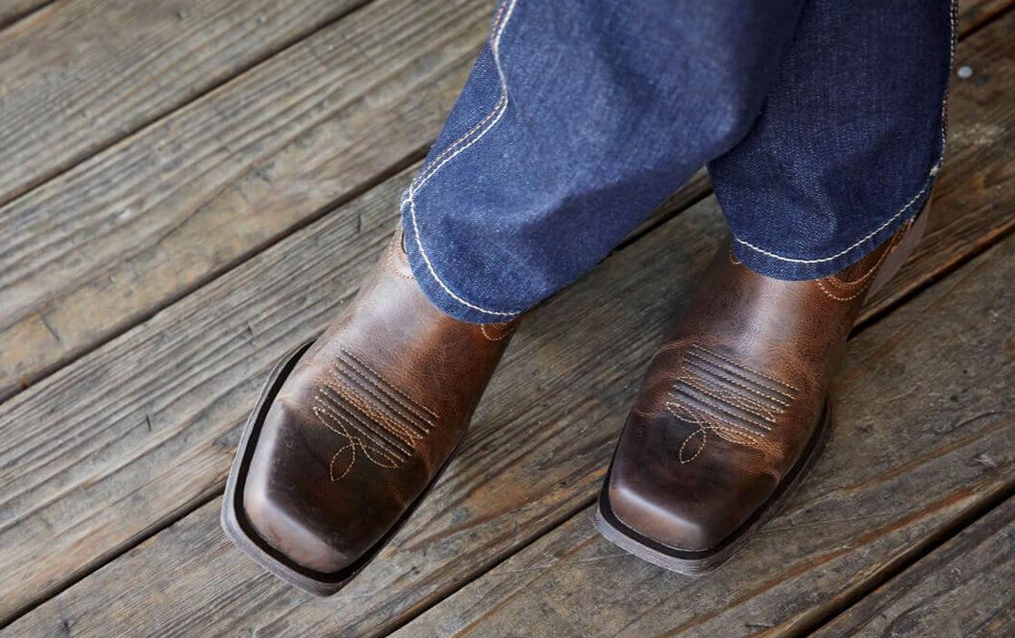 ariat cowboy boots on wood